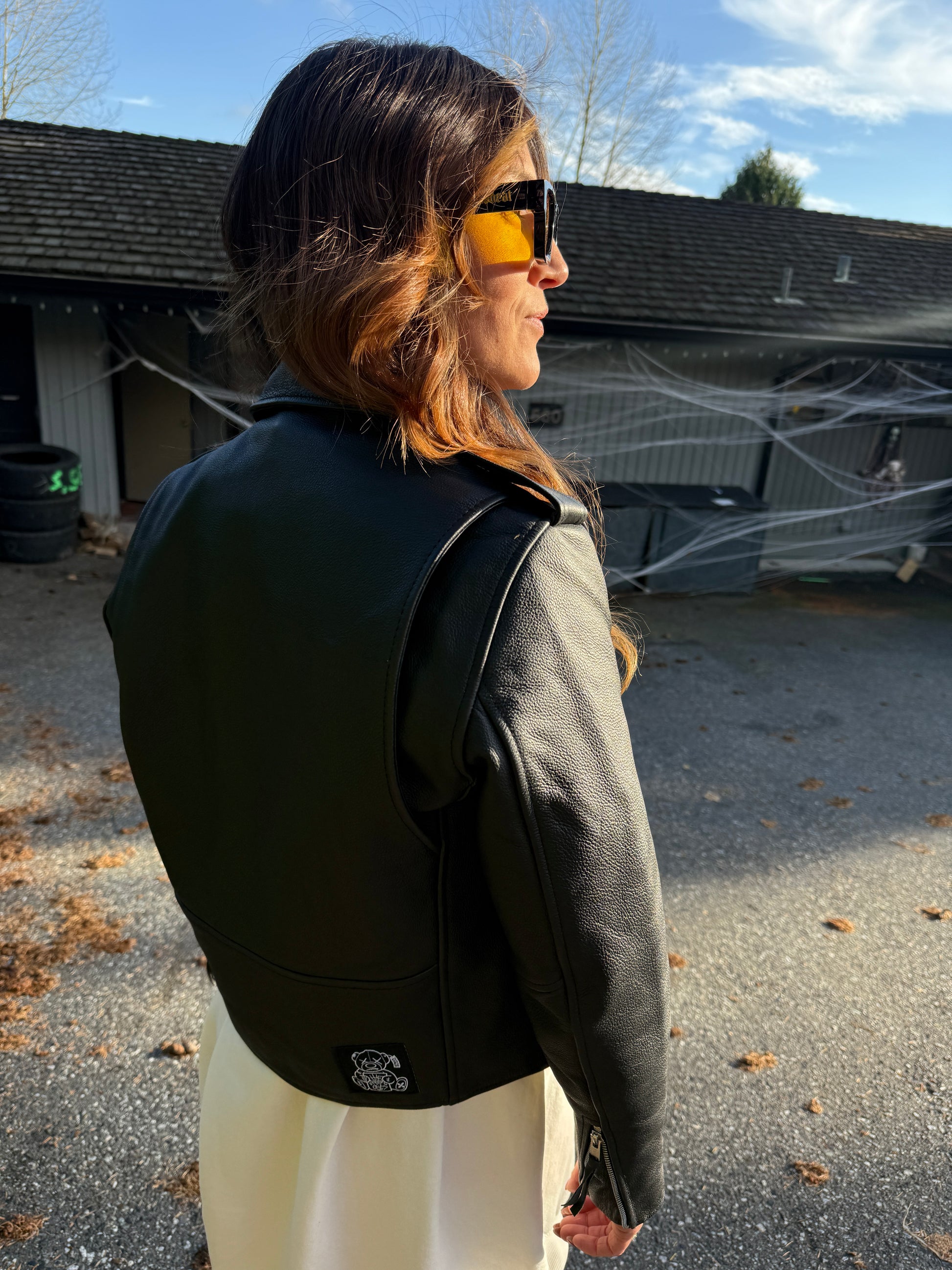 The Vanishing Ones women's leather jacket detail — underground lifestyle streetwear Canada